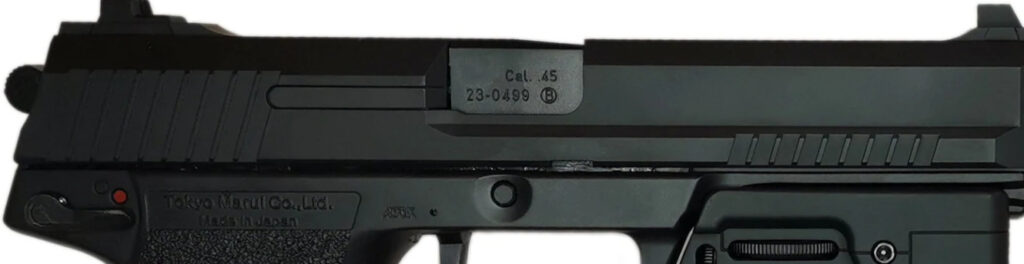 picture of tokyo marui mk23 from side showing serrated slides