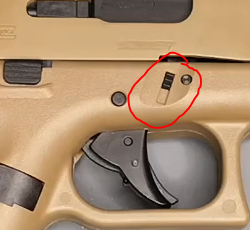 close up picture showing the glock 19x takedown levers