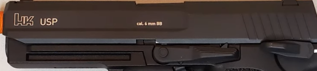 picture of trademarks on side of Umarex H&K USP CO2 pistol