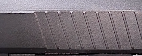 close up picture of slide serrations on Umarex USP CO2 airsoft pistol