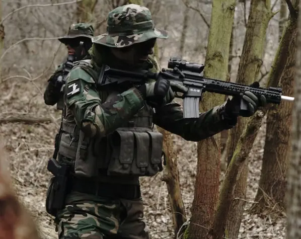 picture of airsoft players with realistic loadouts
