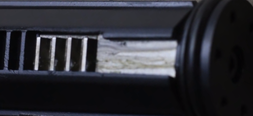 close up showing metal teeth on nautilus piston