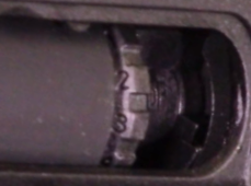 close up picture of hop up unit on krytac alpha crb showing numbers