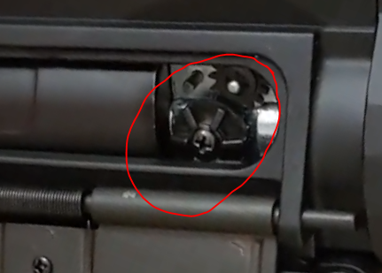 picture of emg umbrella m4 hop up under dust cover being adjusted