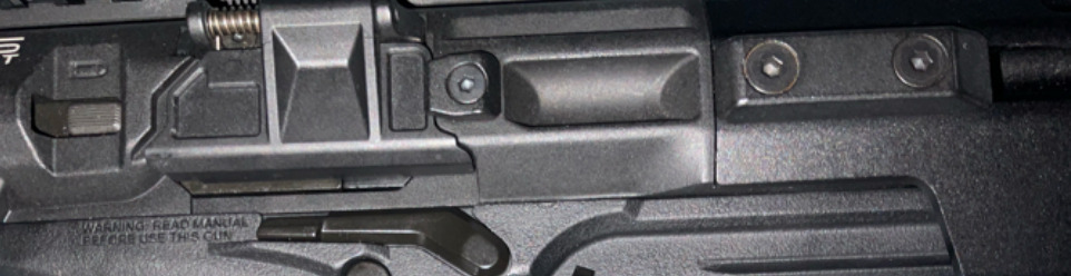 close up picture showing ambidextrous controls on smc9