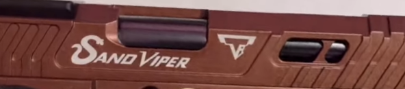 picture of sand viper logo on the slide of the tti sand viper