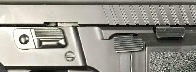 close up picture of controls on sig p226 mk25 airsoft pistol 