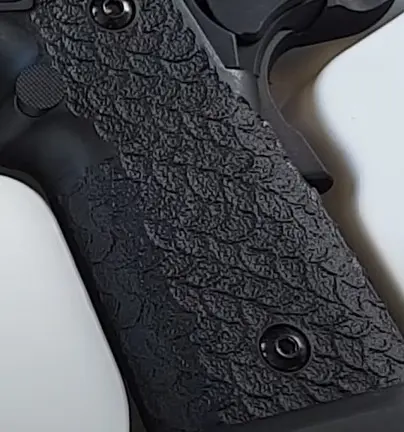 close up picture of taran tactical sti combat master dvc grips