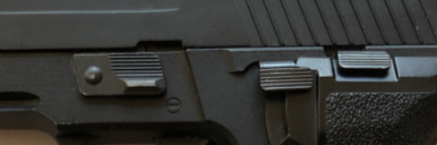 close up picture of we f226 mk25 airsoft pistol showing all its controls