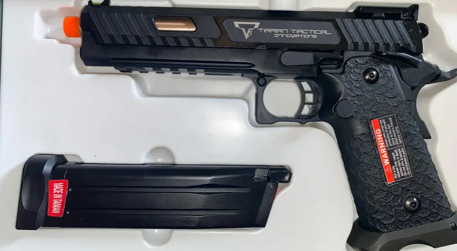 picture of taran tactical sti combat master 2011 airsoft pistol being unboxed