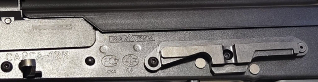 close up picture of trademarks and proof mark replicas on tokyo marui saiga 12k