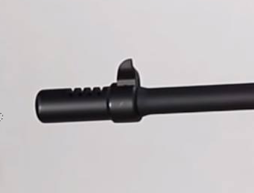 close up picture of airsoft m1928 tommy gun barrel showing cutt compensator