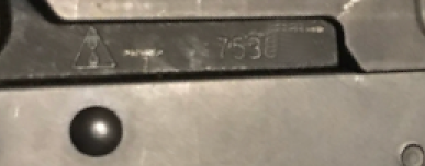 close up picture of ak-style markings found on the lct ak74m series of airsoft rifles