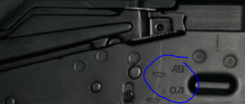 close up picture of cyrillic lettering found on lct ak74m selector switch